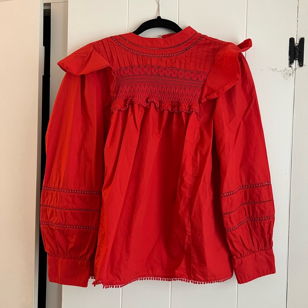 Jcrew cotton blouse. Button detail at the back.
